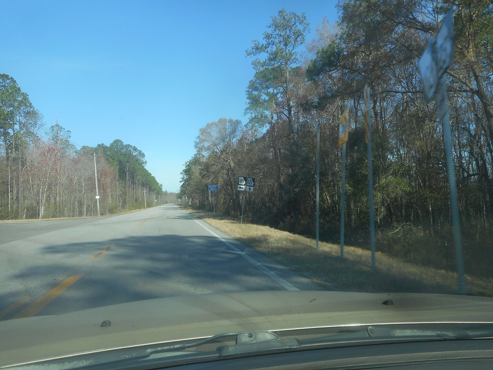 Roadside sign reading Dial 911 on a Georgia state route