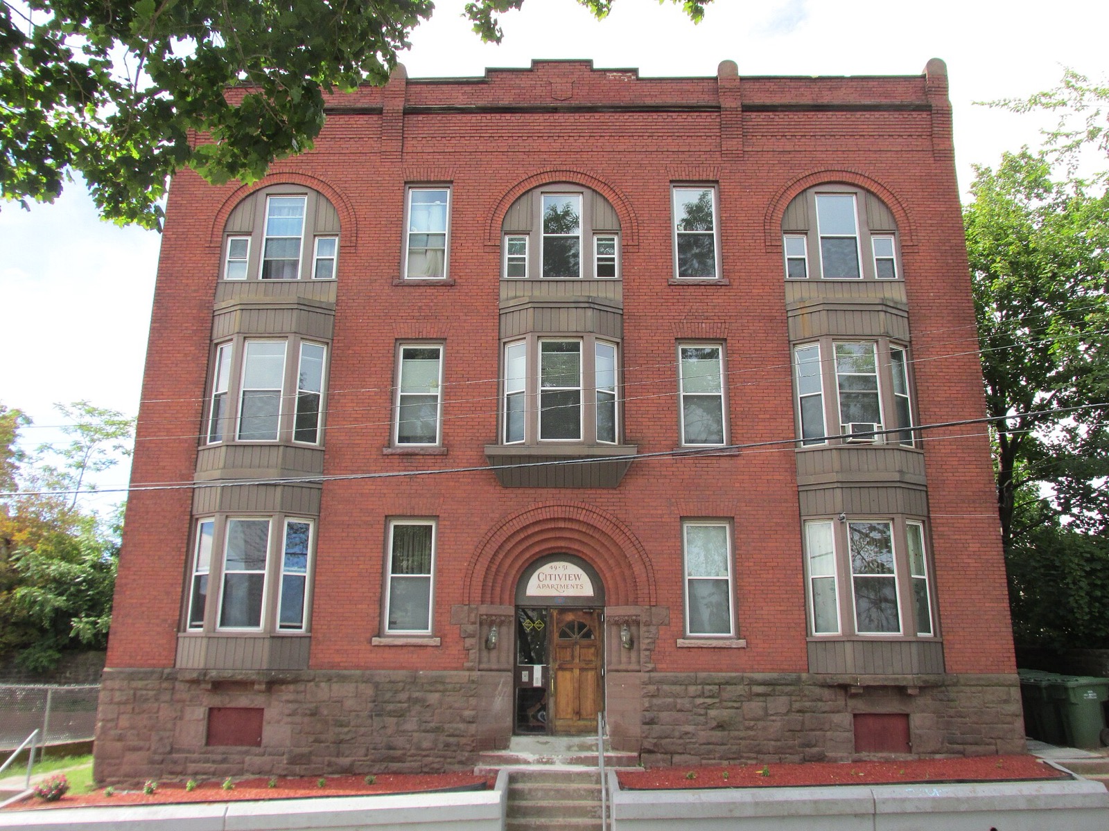 Brick apartment building at 49-51 Spring Street in Hartford, Connecticut
